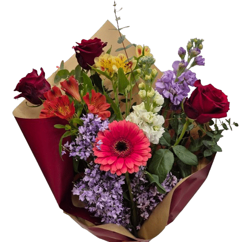 Mazzo di fiori con rose rosse e fiori colorati